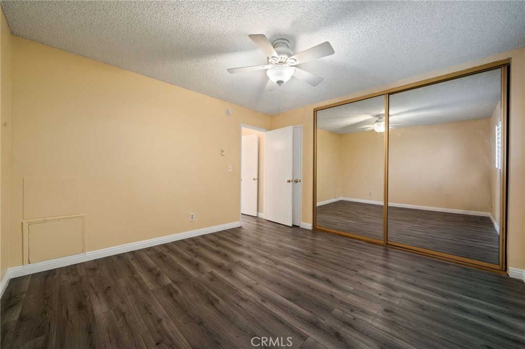 1311 South Grand Avenue, Unit 5 San Pedro, CA 90731 - Photo 11 of 20 a view of an empty room with wooden floor