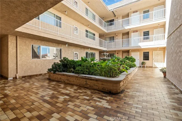 a house with a bench in front of it