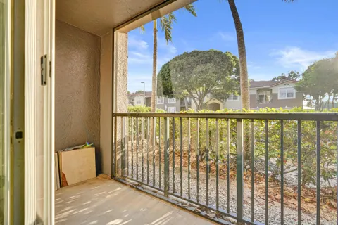a view of a glass door and a window