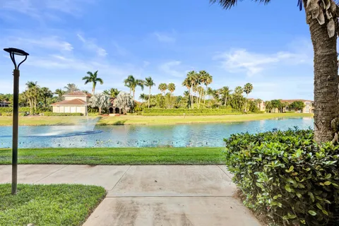 a view of a lake with a yard