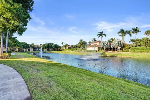 a view of lake with a yard