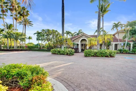 a view of swimming pool with a patio and a yard
