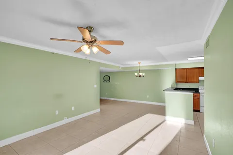 a kitchen with a refrigerator a stove top oven a sink and dishwasher
