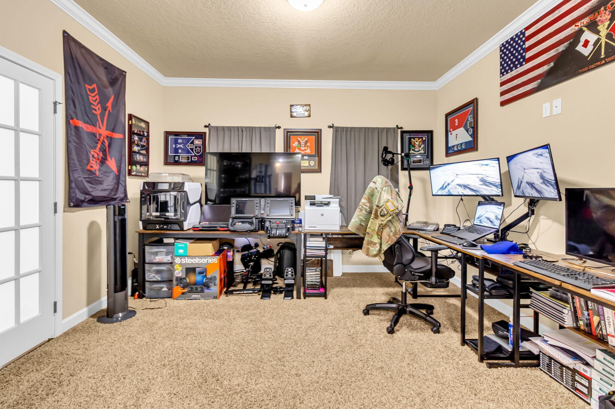 4558 Hermosa Road Crestview, FL 32539 - Photo 23 of 50 a view of a room with gym equipment
