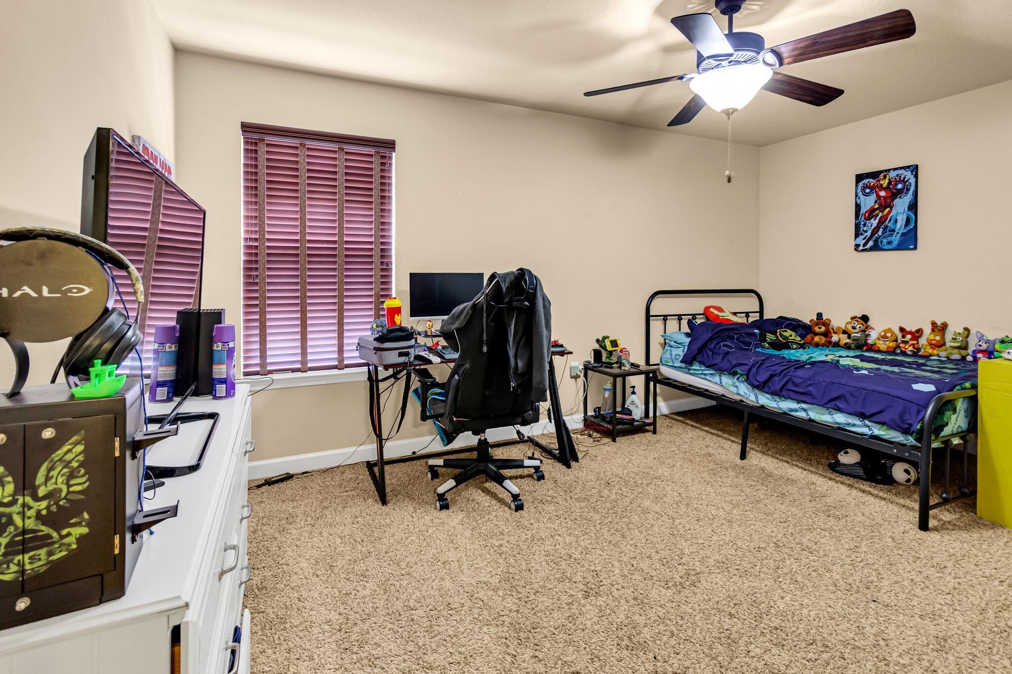 4558 Hermosa Road Crestview, FL 32539 - Photo 32 of 50 a view of a workspace with furniture and a window