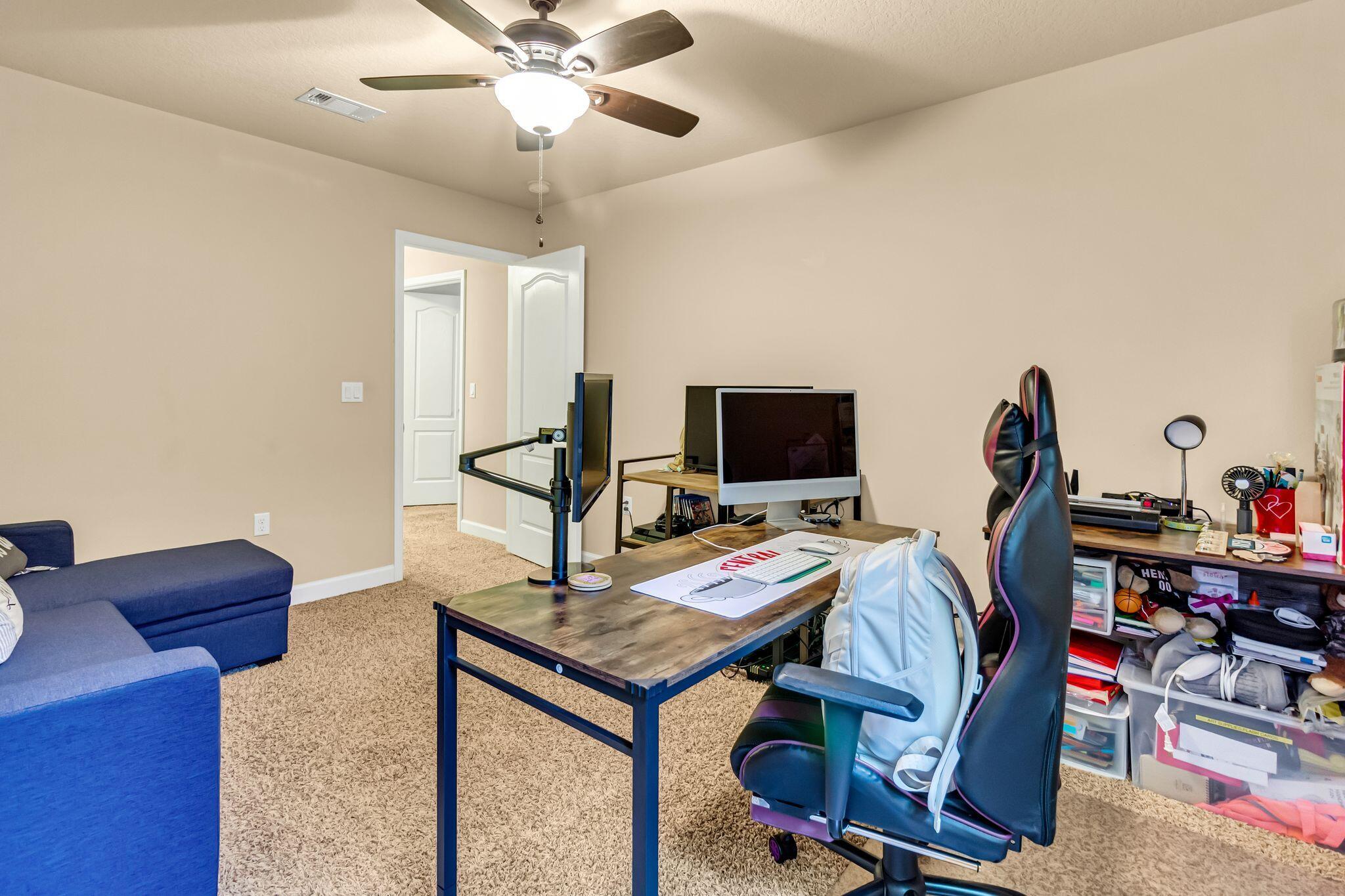 4558 Hermosa Road Crestview, FL 32539 - Photo 43 of 50 a view of a workspace with furniture