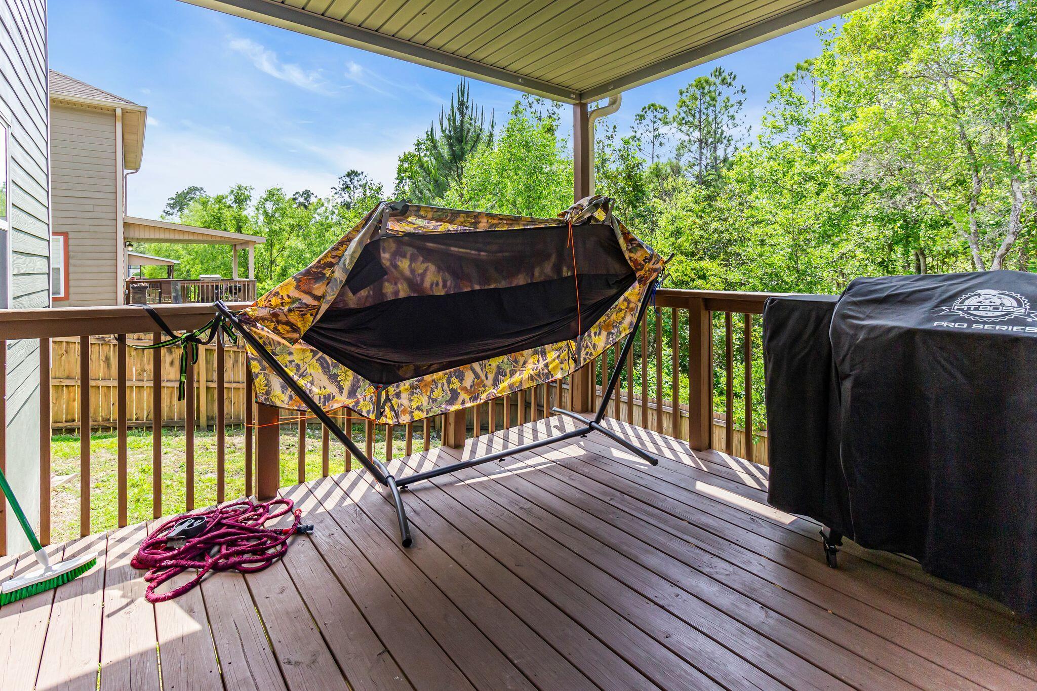 4558 Hermosa Road Crestview, FL 32539 - Photo 47 of 50 a view of balcony with wooden floor