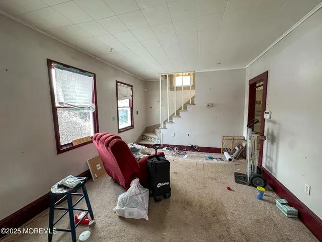 a workspace with furniture and a window