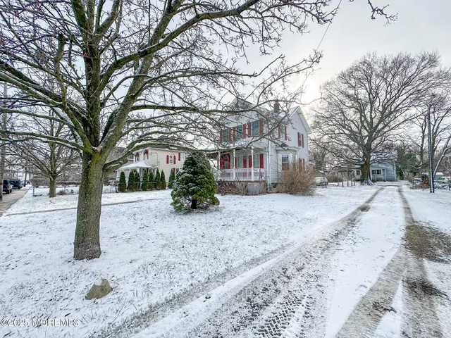 a road view covered with snow