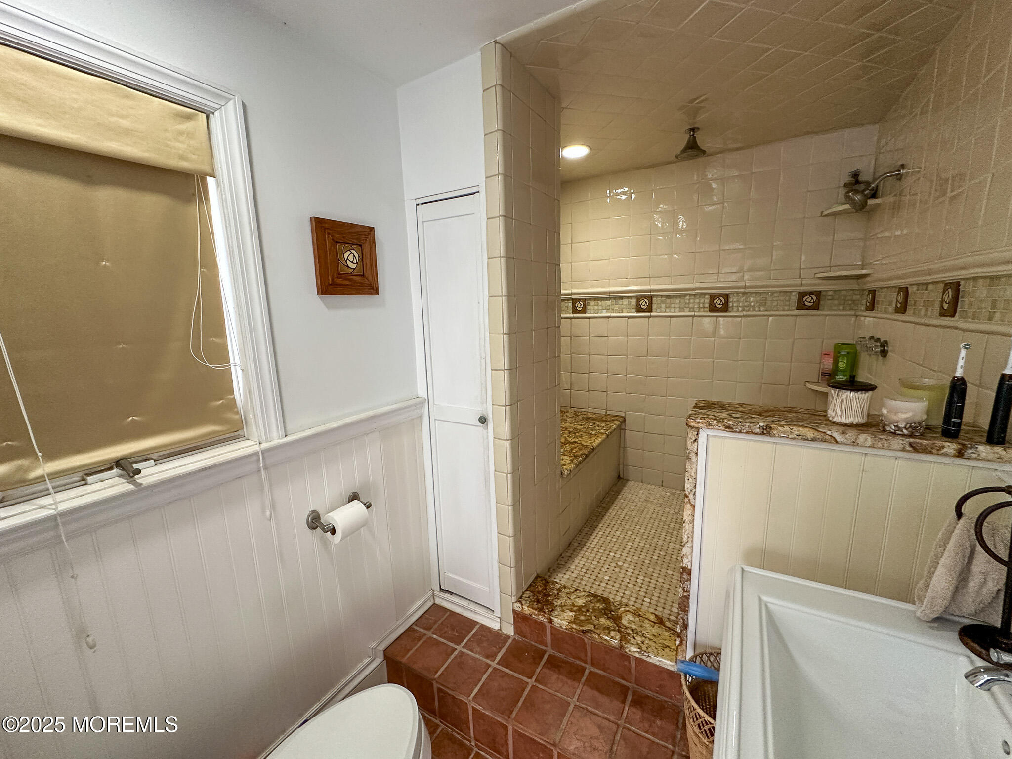80 Atlantic Avenue Long Branch, NJ 07740 - Photo 10 of 31 a bathroom with a sink toilet and shower
