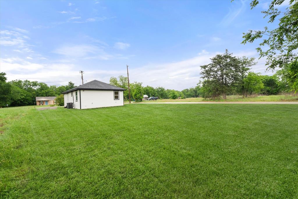 901 South 3rd Dawson, TX 76639 - Photo 24 of 32 a house view with swimming pool in front of it