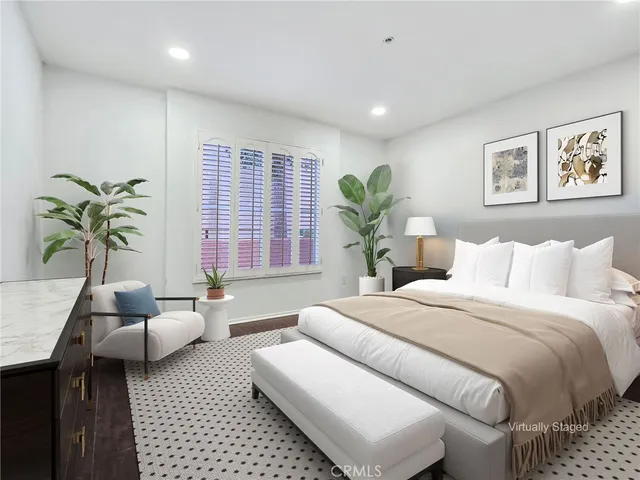 a bedroom with furniture and a couch