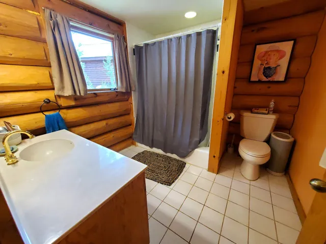 a bathroom with a sink and a vanity