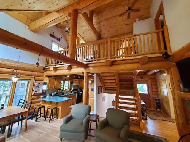 a view of a chairs and table in a patio