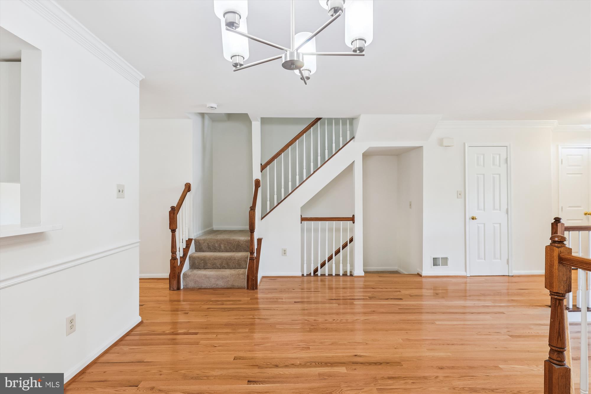 8840 Eagle Rock Lane Springfield, VA 22153 - Photo 11 of 52 a view of entryway and hall with wooden floor