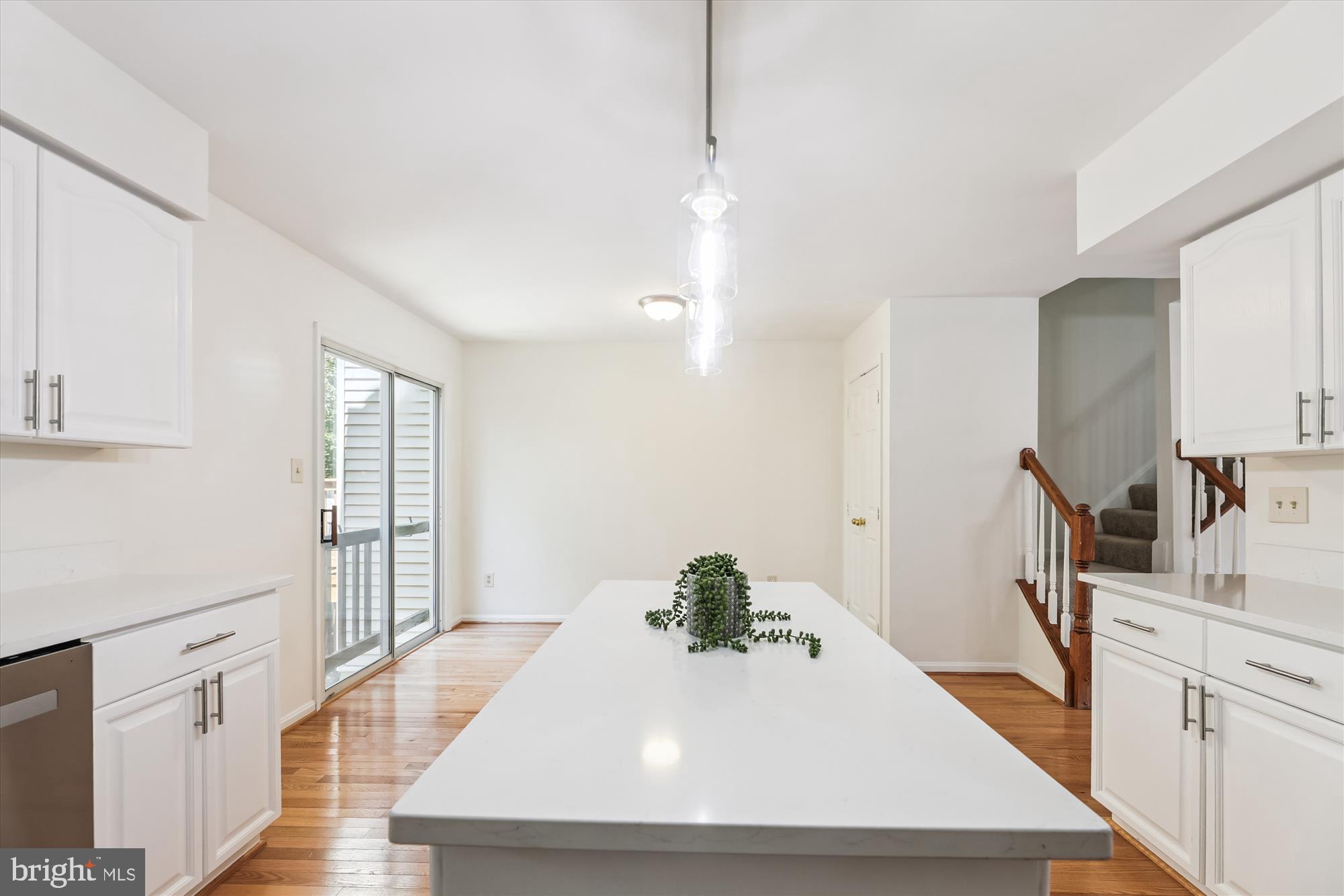 8840 Eagle Rock Lane Springfield, VA 22153 - Photo 15 of 52 a view of kitchen with cabinets and wooden floor