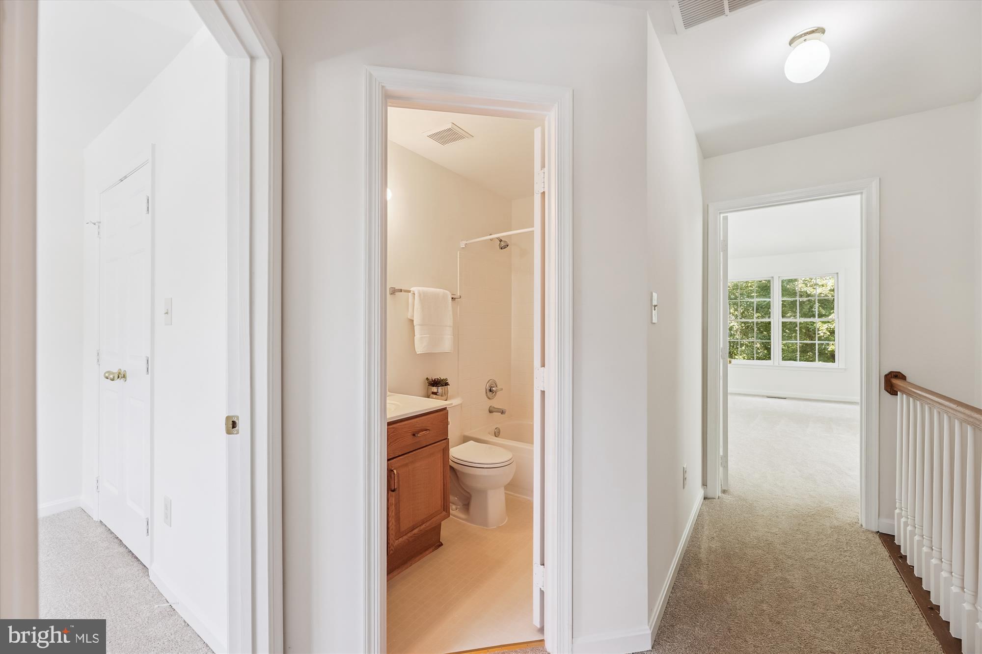 8840 Eagle Rock Lane Springfield, VA 22153 - Photo 19 of 52 a view of a bathroom from a hallway