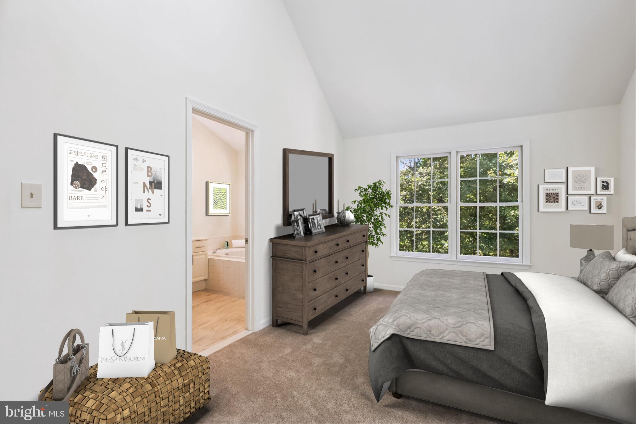 8840 Eagle Rock Lane Springfield, VA 22153 - Photo 21 of 52 a spacious bedroom with a bed and a couch