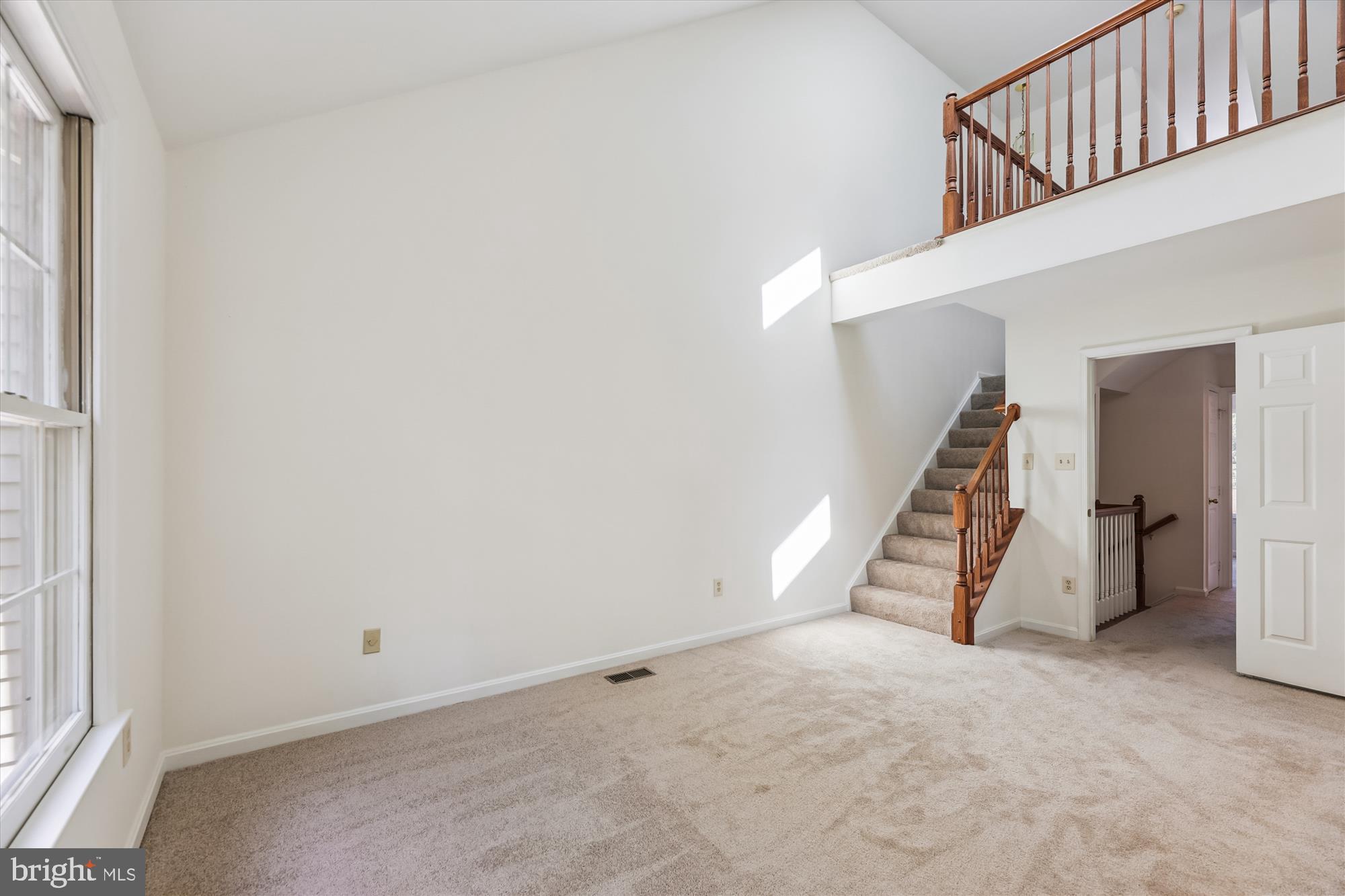 8840 Eagle Rock Lane Springfield, VA 22153 - Photo 24 of 52 a view of an empty room with stairs