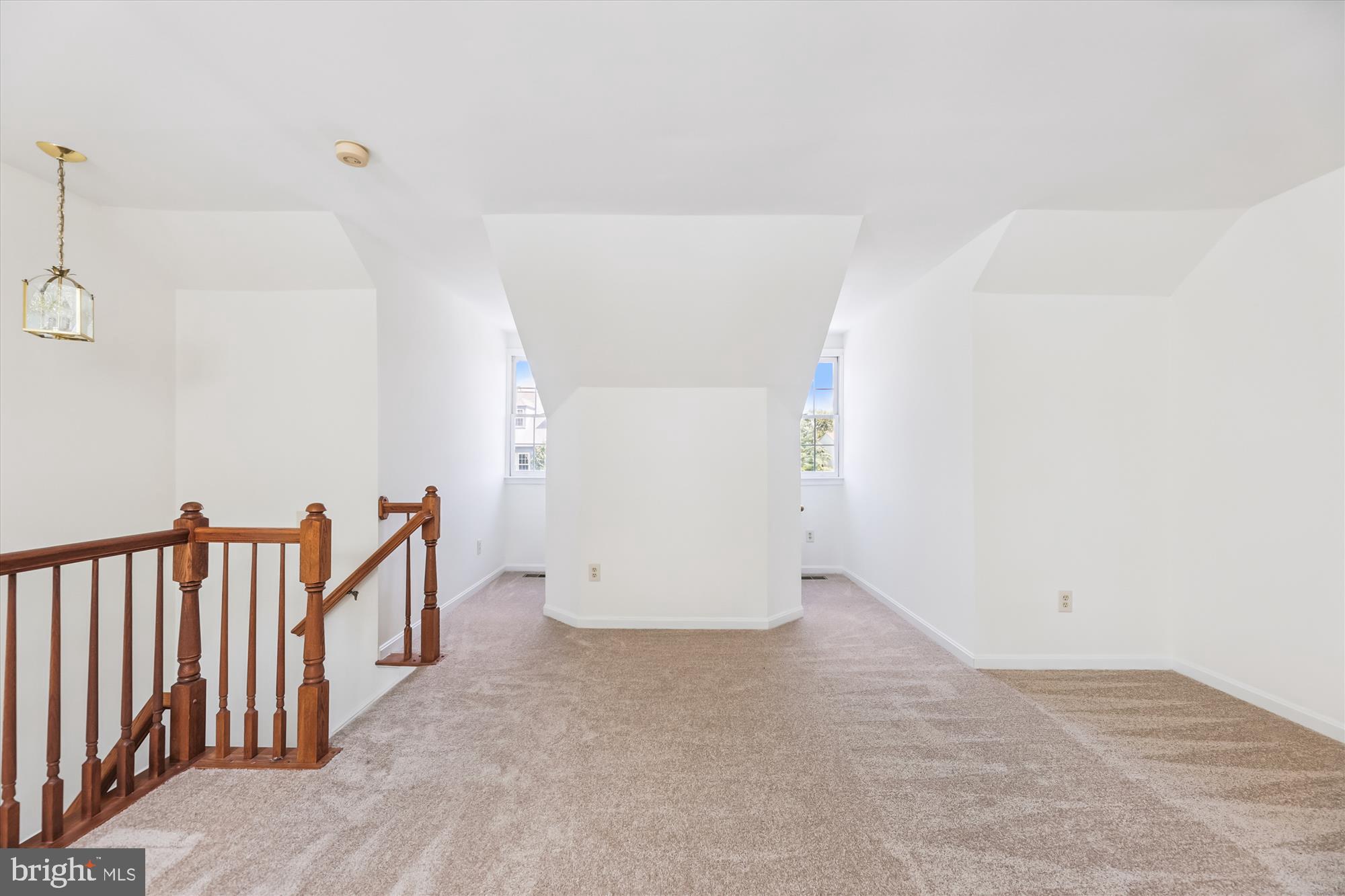 8840 Eagle Rock Lane Springfield, VA 22153 - Photo 30 of 52 a view of a hallway with staircase