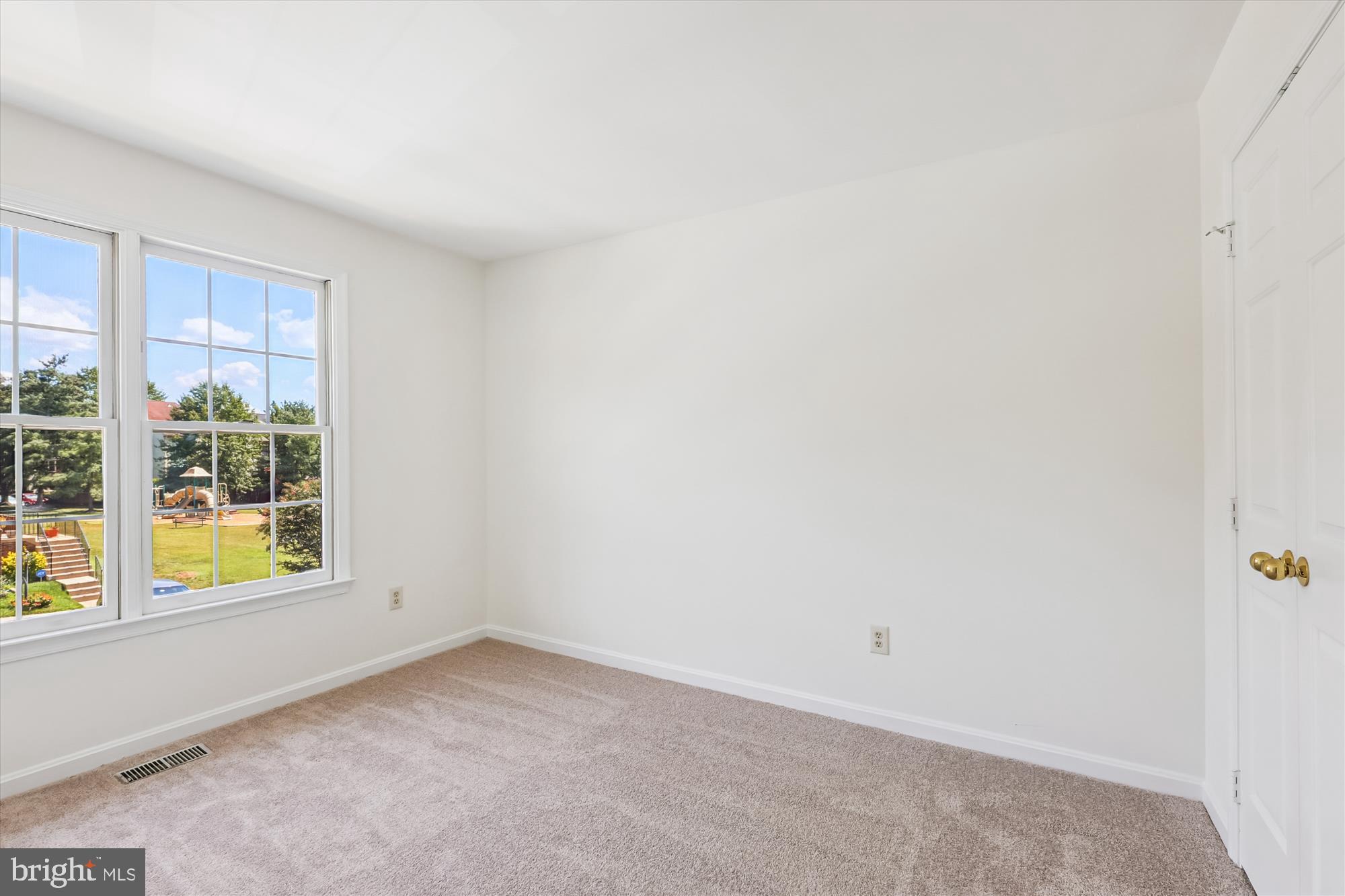 8840 Eagle Rock Lane Springfield, VA 22153 - Photo 34 of 52 a view of an empty room with a window