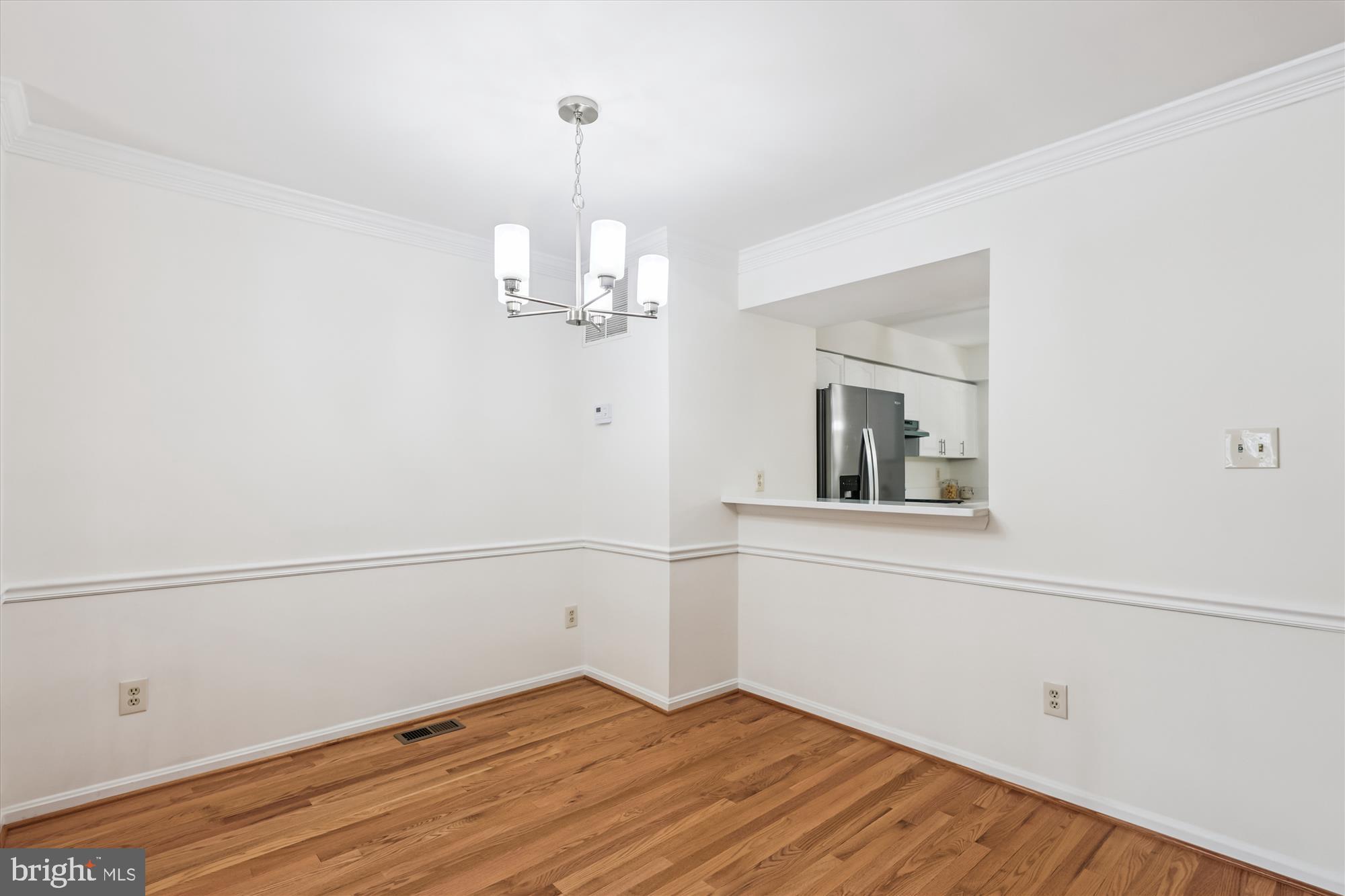 8840 Eagle Rock Lane Springfield, VA 22153 - Photo 9 of 52 a view of empty room with wooden floor