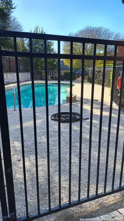 a view of staircase with railing