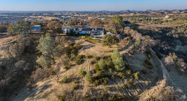 a view of a golf course with a lake