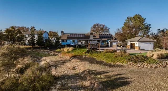 a view of a lake with a big yard