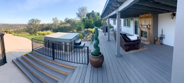 a view of house with swimming pool and outdoor space
