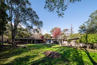 210 Uplands Drive Hillsborough, CA 94010 - Photo 7 of 12 a view of a house with a garden