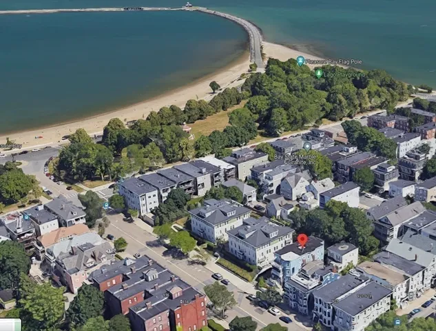 an aerial view of a city with lots of residential buildings