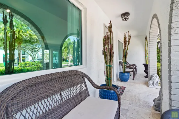 a kitchen with stainless steel appliances granite countertop a refrigerator stove and microwave