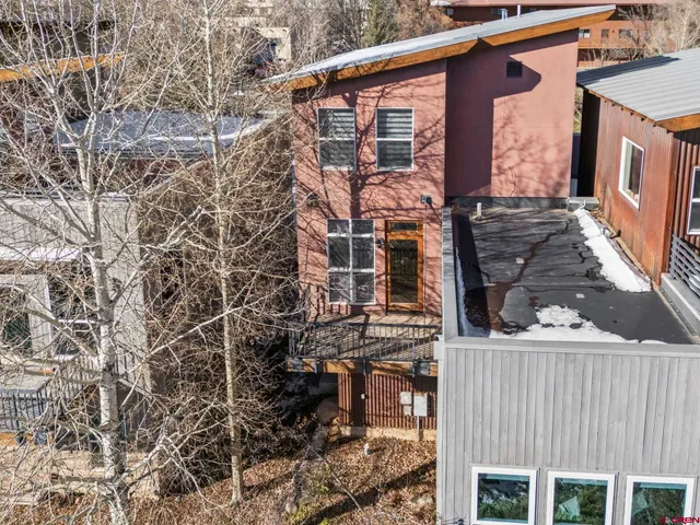 a view of a house with a street