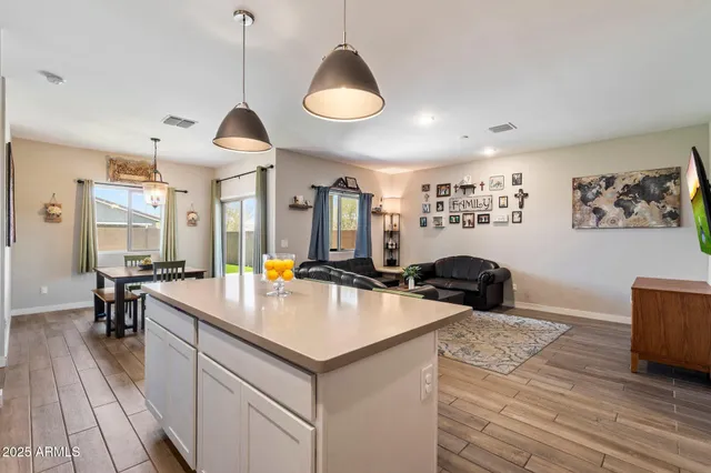 a bedroom with furniture and flat screen tv