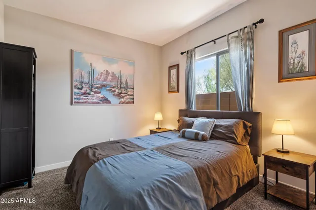 a kitchen with kitchen island a stove cabinets and wooden floor