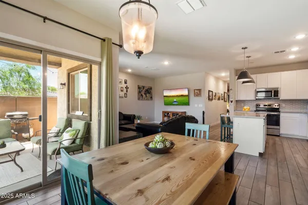 a bedroom with furniture and flat screen tv