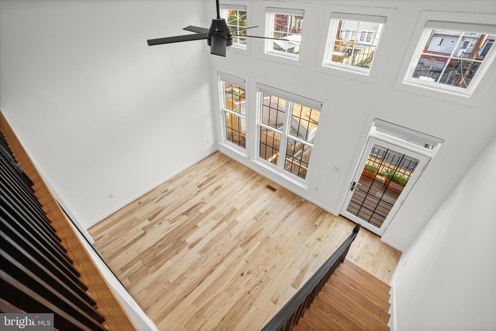 3626 T Street Northwest Washington, DC 20007 - Photo 24 of 61 a view of an empty room and wooden floor