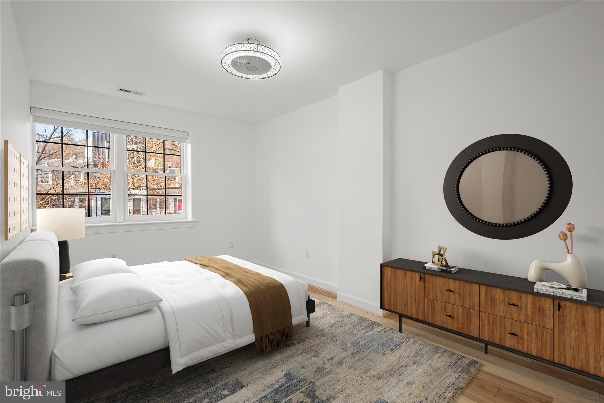 3626 T Street Northwest Washington, DC 20007 - Photo 26 of 61 a bedroom with a large bed and a large window