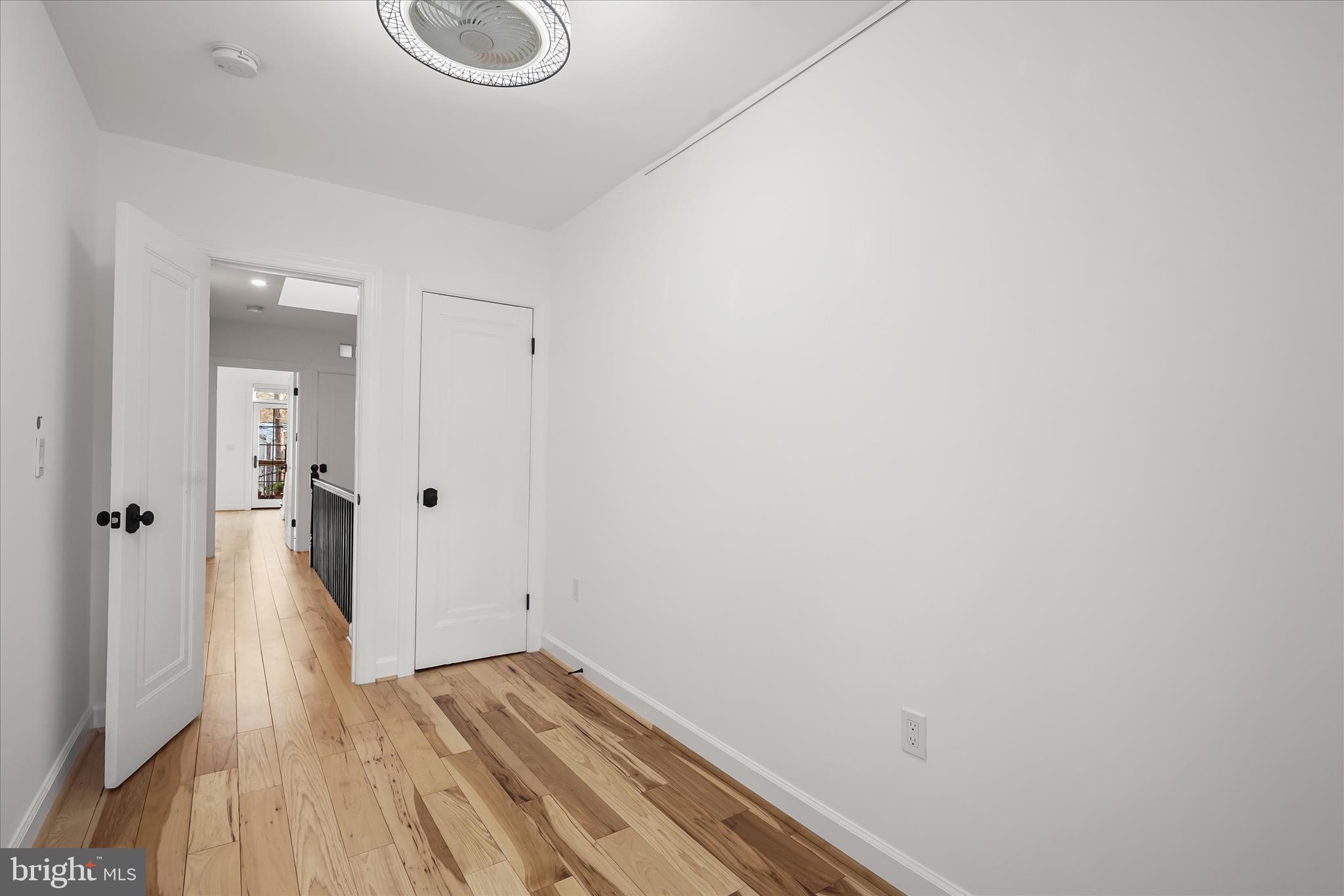 3626 T Street Northwest Washington, DC 20007 - Photo 31 of 61 a view of a room with wooden floor and white doors