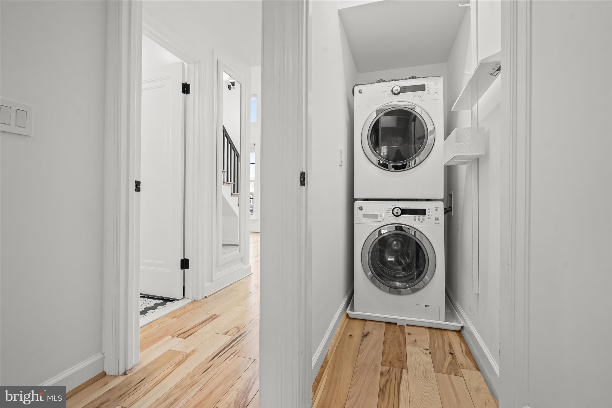 3626 T Street Northwest Washington, DC 20007 - Photo 32 of 61 a view of a hallway with washer and dryer