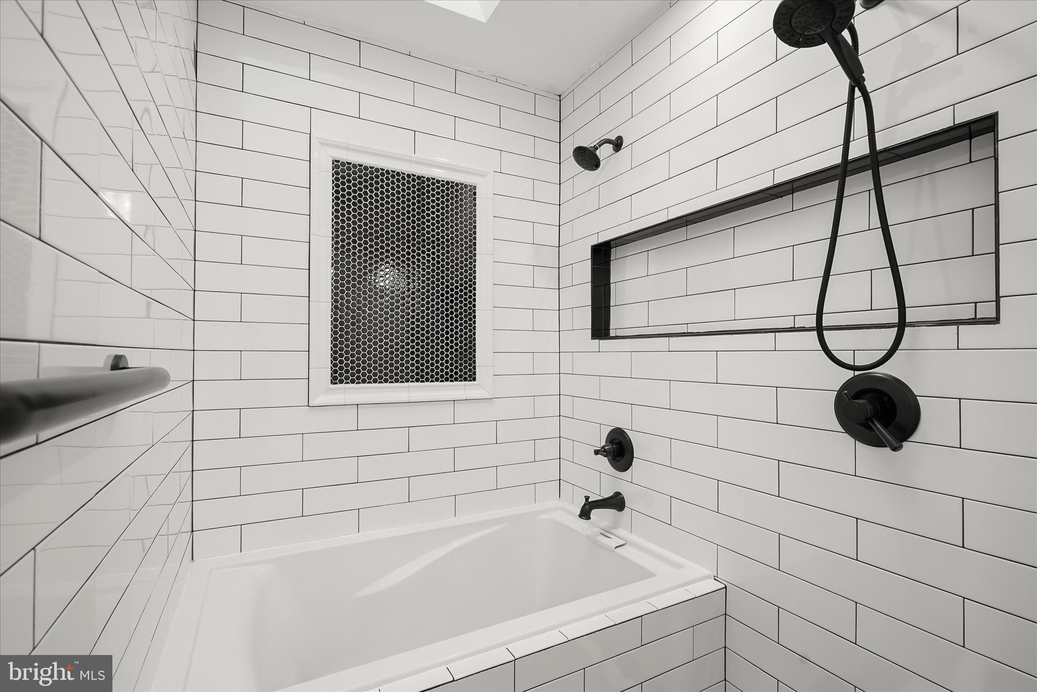 3626 T Street Northwest Washington, DC 20007 - Photo 34 of 61 a bathroom with a shower and bathtub