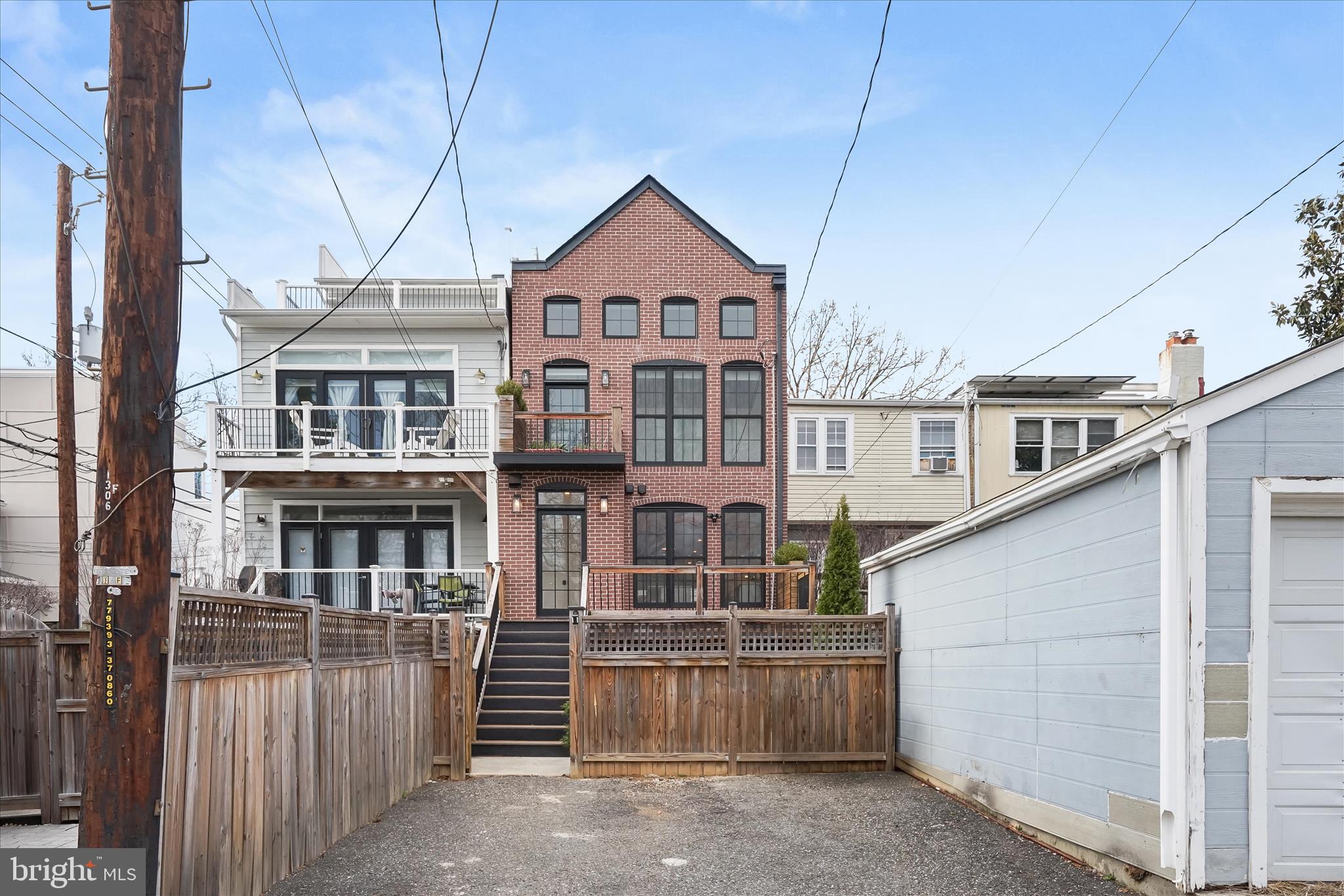 3626 T Street Northwest Washington, DC 20007 - Photo 45 of 61 a front view of a house with a garage