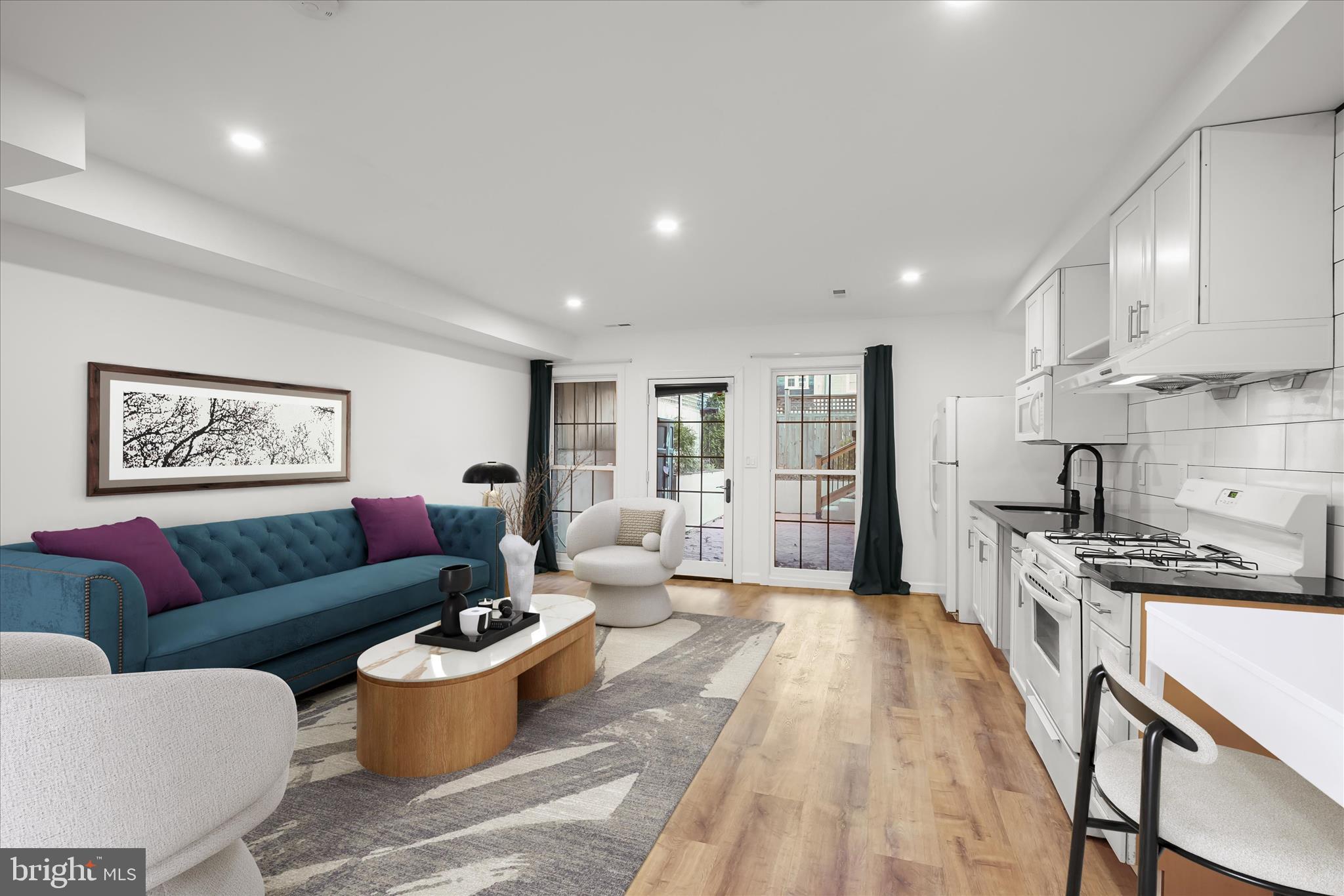 3626 T Street Northwest Washington, DC 20007 - Photo 5 of 61 a living room with furniture and a wooden floor