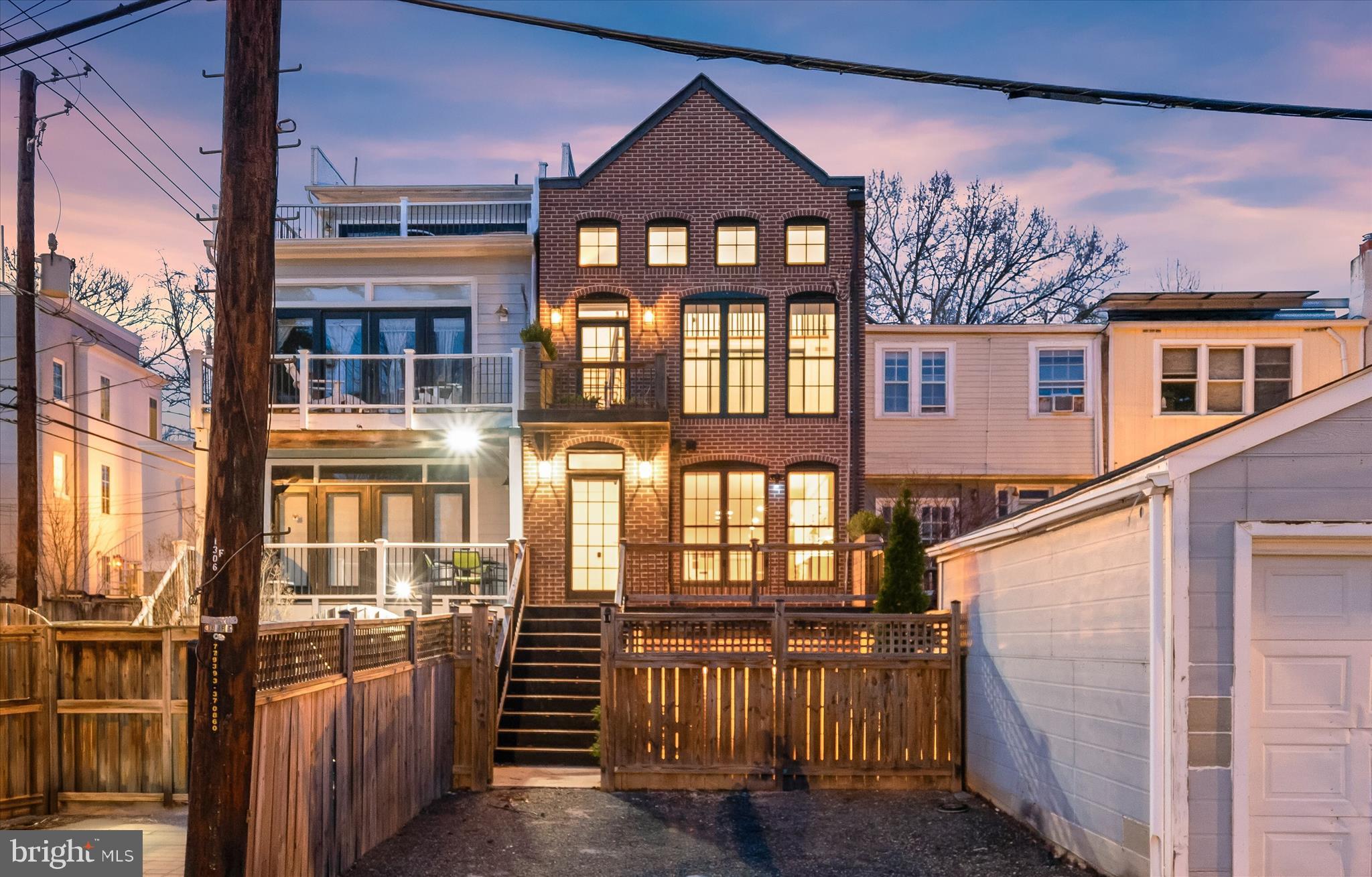 3626 T Street Northwest Washington, DC 20007 - Photo 51 of 61 a view of a brick house with a wooden door