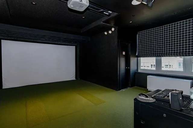 a view of a a dining room with furniture and wooden floor