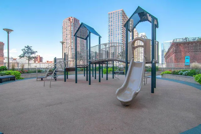 a view of a swimming pool with a lounge chair