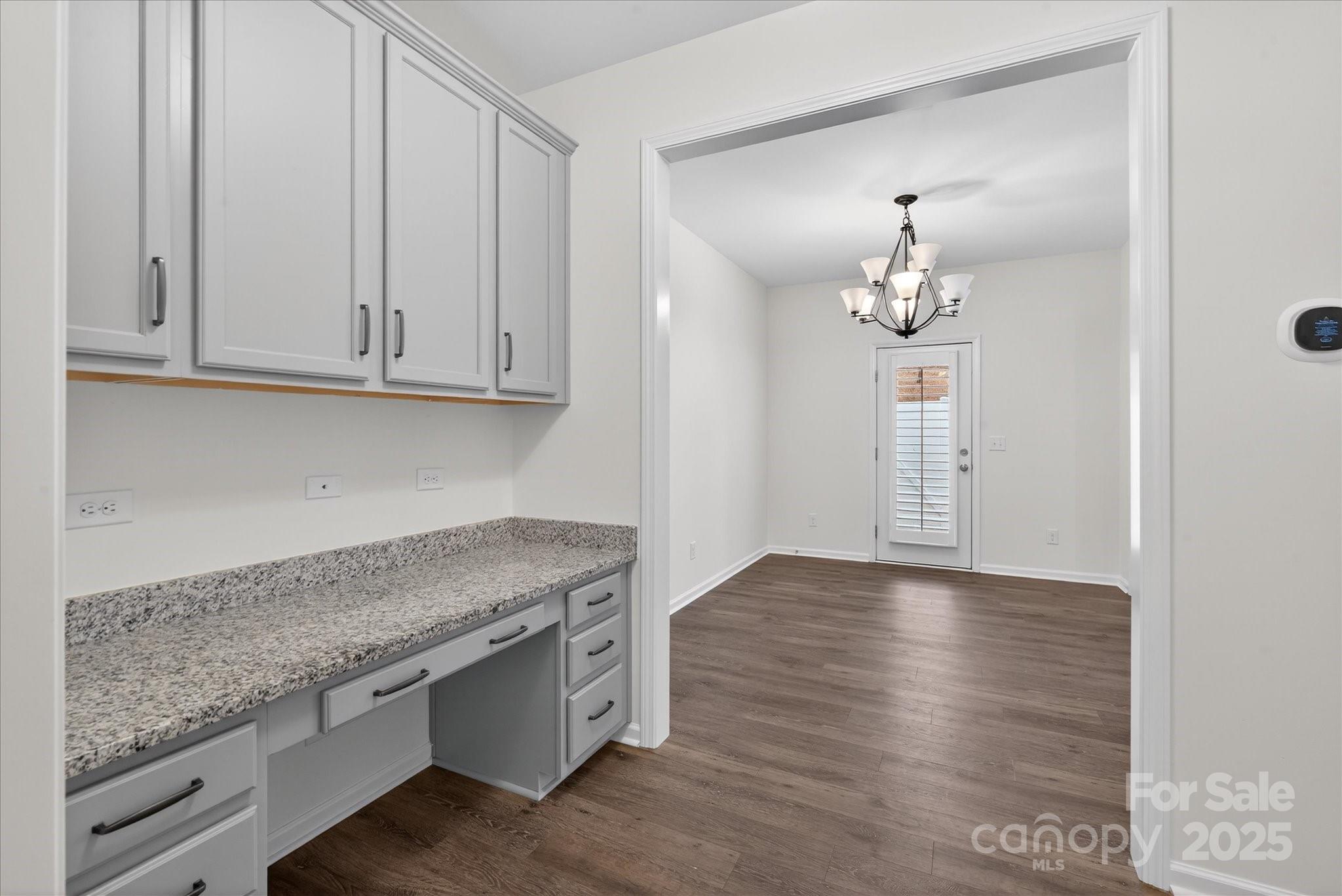 7481 Hartsfield Drive Lancaster, SC 29720 - Photo 12 of 47 a view of cabinets and wooden floor