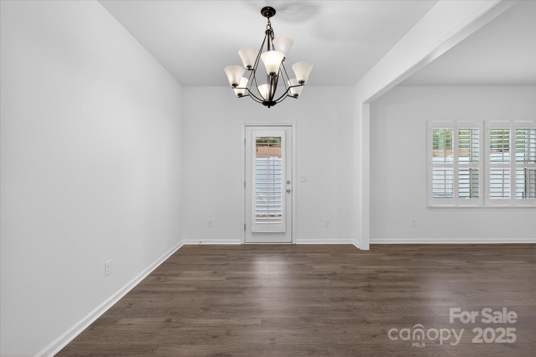7481 Hartsfield Drive Lancaster, SC 29720 - Photo 14 of 47 a view of an entryway with wooden floor