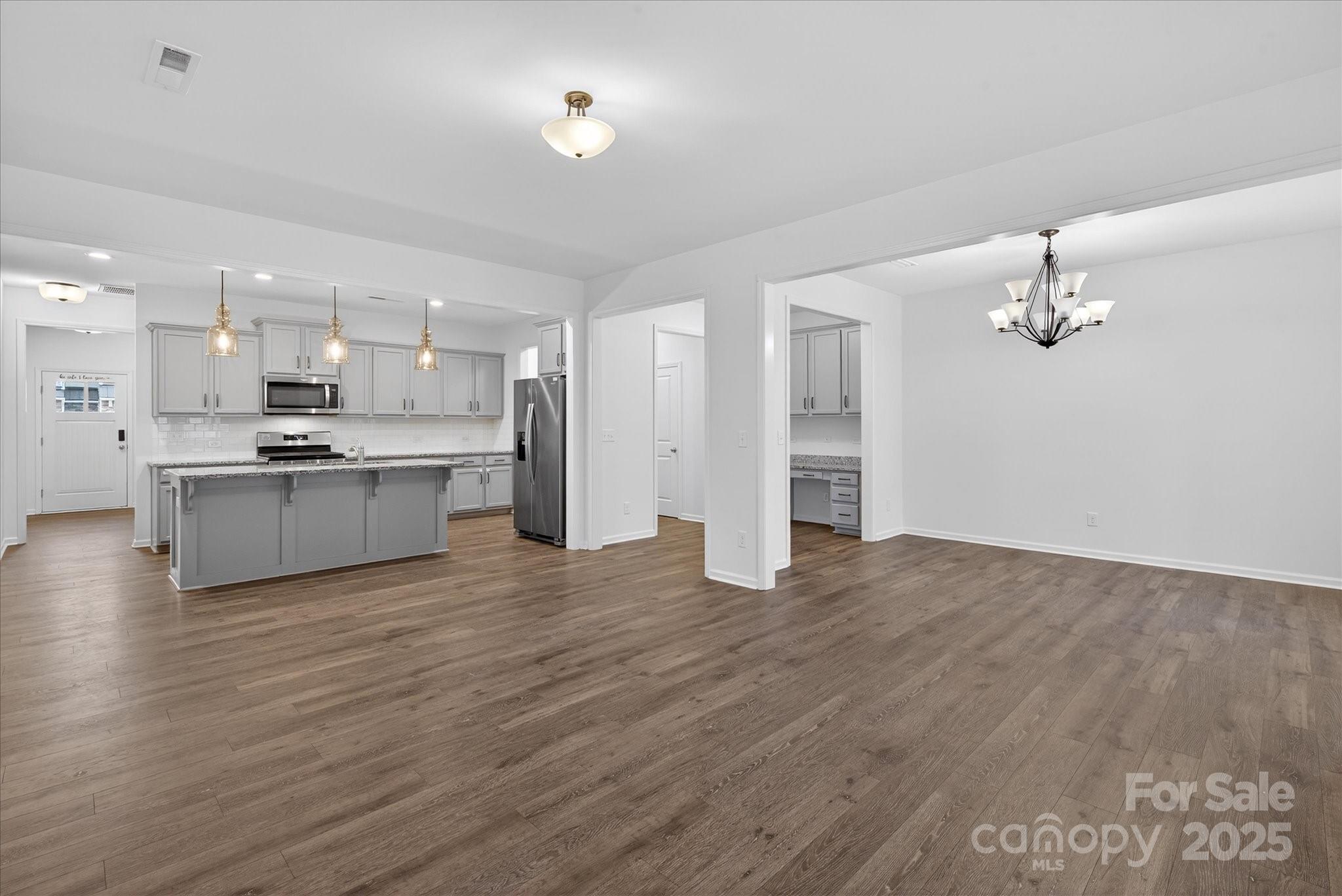 7481 Hartsfield Drive Lancaster, SC 29720 - Photo 19 of 47 a view of kitchen with wooden floor